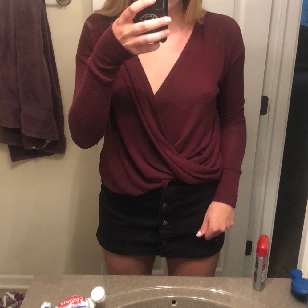 maroon low-cut shirt